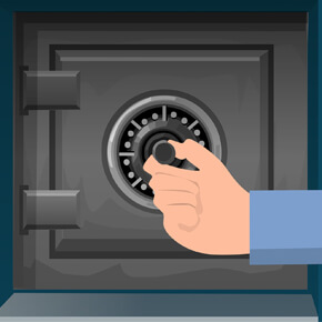 A black safe with someone trying to turn knob to open it
