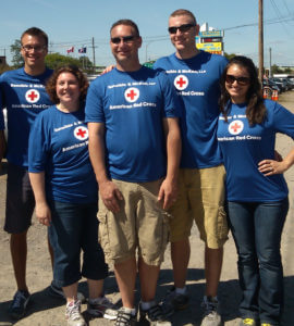 Employees of Dannible & McKee, Dalton, Charla, Sean and Sara wearing Red Cross t-shirt