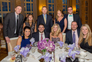 Partners and employees of Dannible & McKee at a gala event