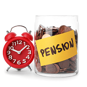 Red alarm clock next to a jar of coins with pension written on a sticky note