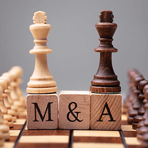 Chess Board with pawns on top of M&A wooden blocks