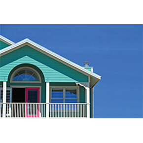 Beach house balcony with bright color house painted