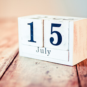 Wooden cubed calendar saying 15 July - extended 2019 tax file deadline due to Coronavirus