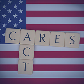 Letter tiles CARES Act On US Flag, 3d illustration