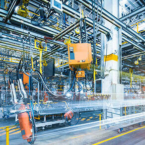 Manufacturing plant with blue and orange colored machinery