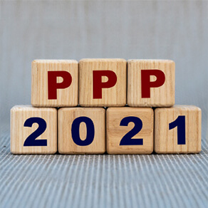 letters in red PPP numbers saying 2021 wooden blocks