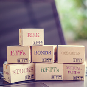 Boxes stacked on top of each other with the financial words on them including 