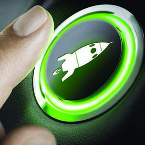 A person's finger about to push a lit button with an image of a rocket ship