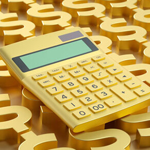 Golden calculator sitting on top of rows of golden dollar signs