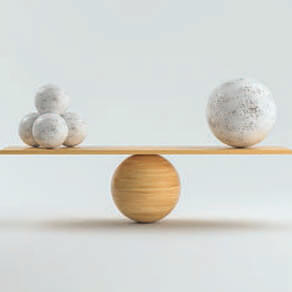 Group of four small balls on one side of scale being evened out by one large ball on other side