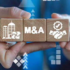 Merger and Acquisition Business Corporate Cooperation Company concept. MA partnership concept on wooden dices in businessman's hands.