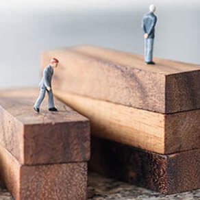 Business, growth and Succession concept. Group of businessman miniature figures walking and standing on wood stair made from wooden blocks toy.