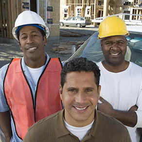 Portrait of a group of architects at construction site