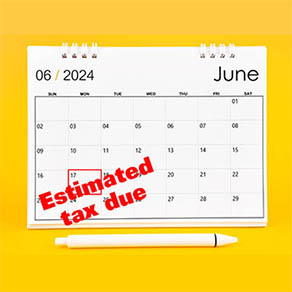 June 2024, Monthly desk calendar for 2024 year and pen on yellow color background.